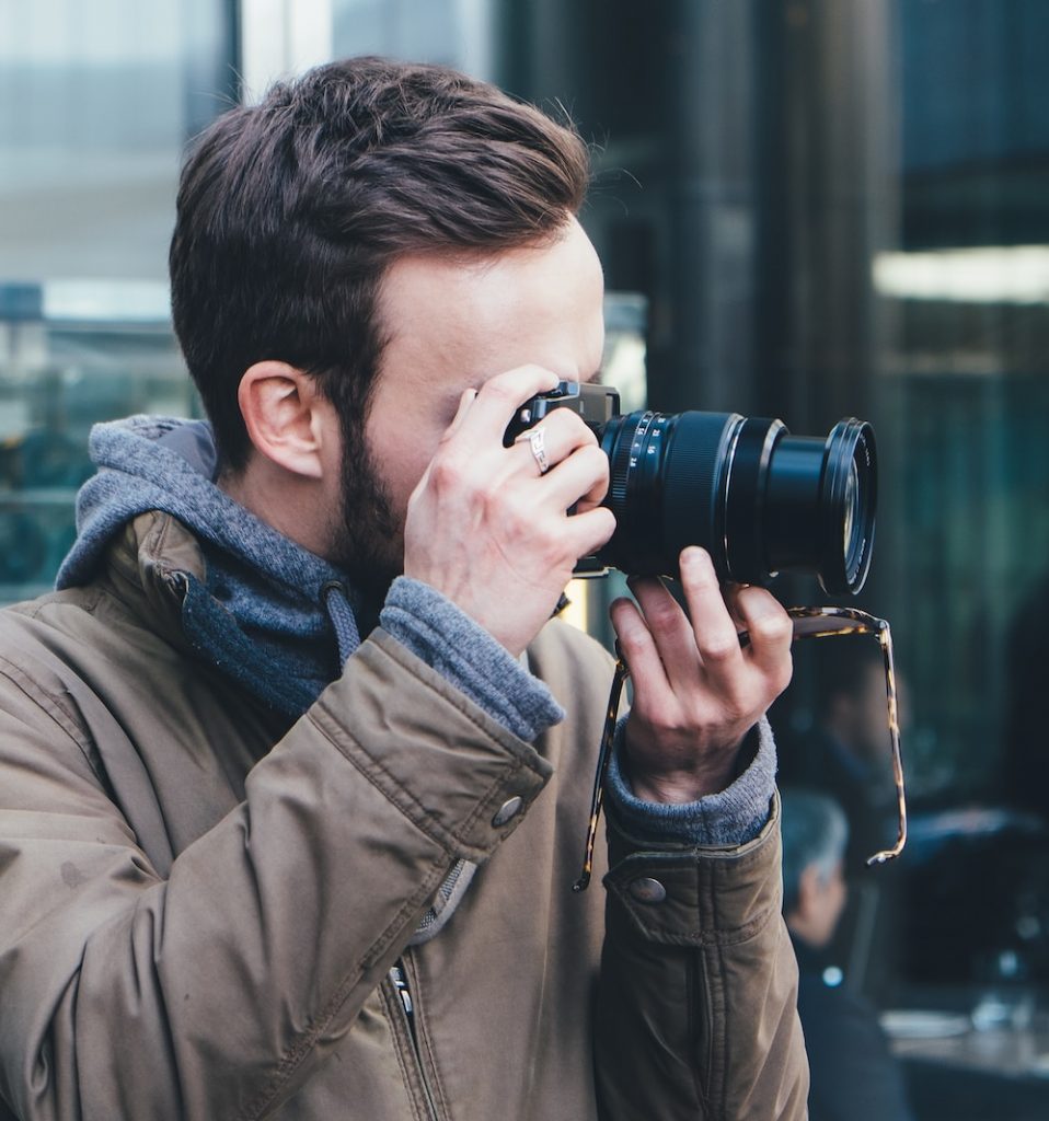 man taking picture